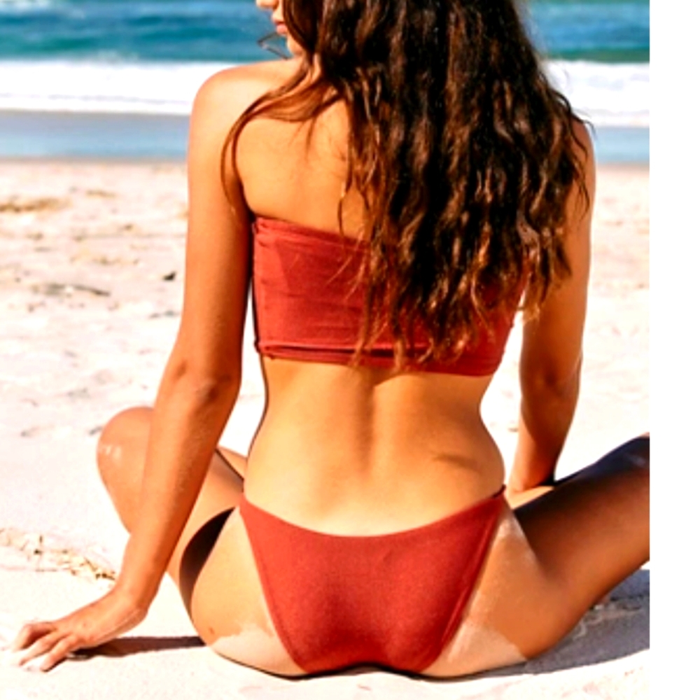 New Free People Kikirio bathing suit. In Copper And Ivory.